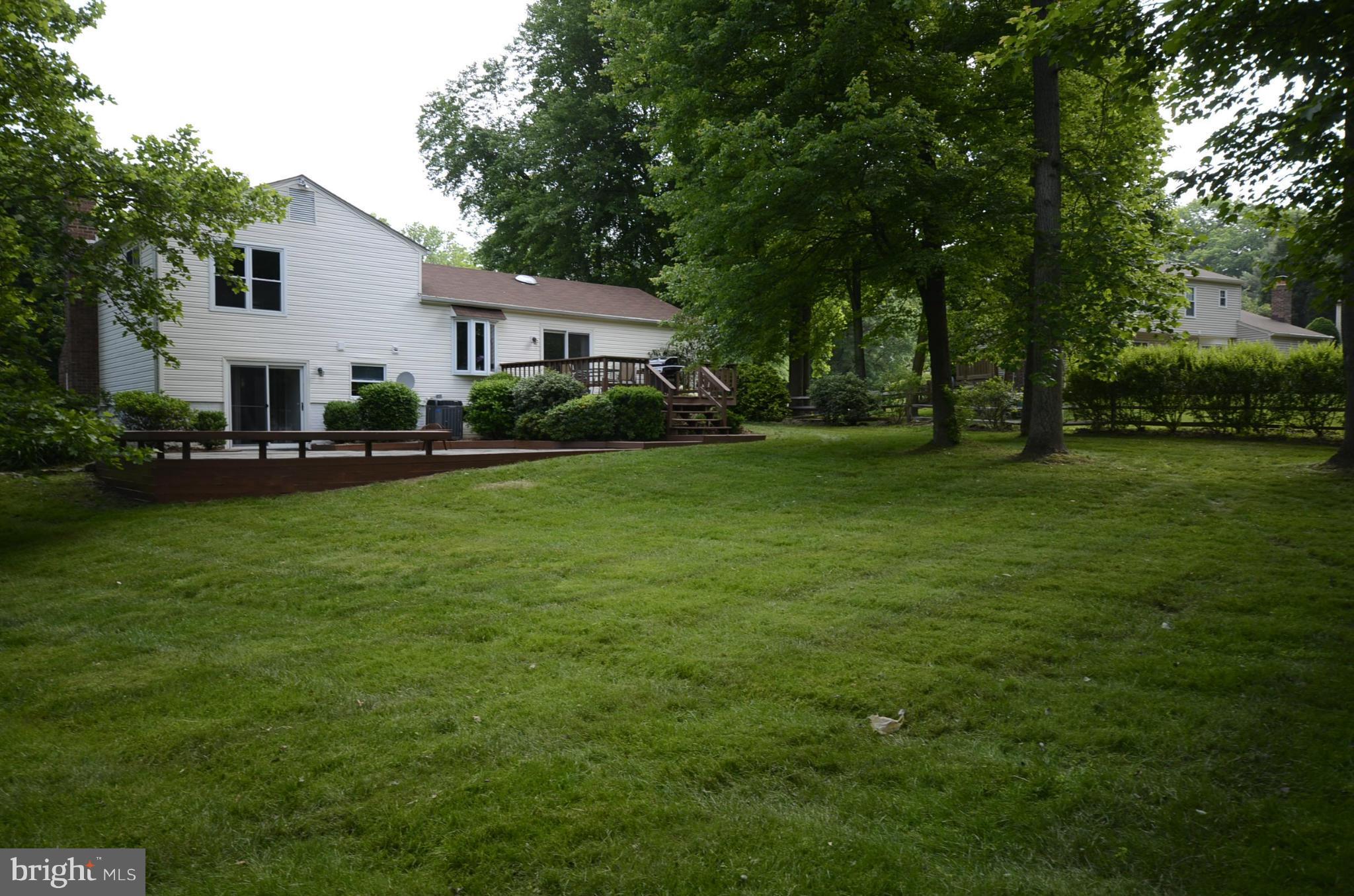 3612 Briars Road Brookeville, MD 20833 - Photo 17 of 21 a front view of a house with a garden