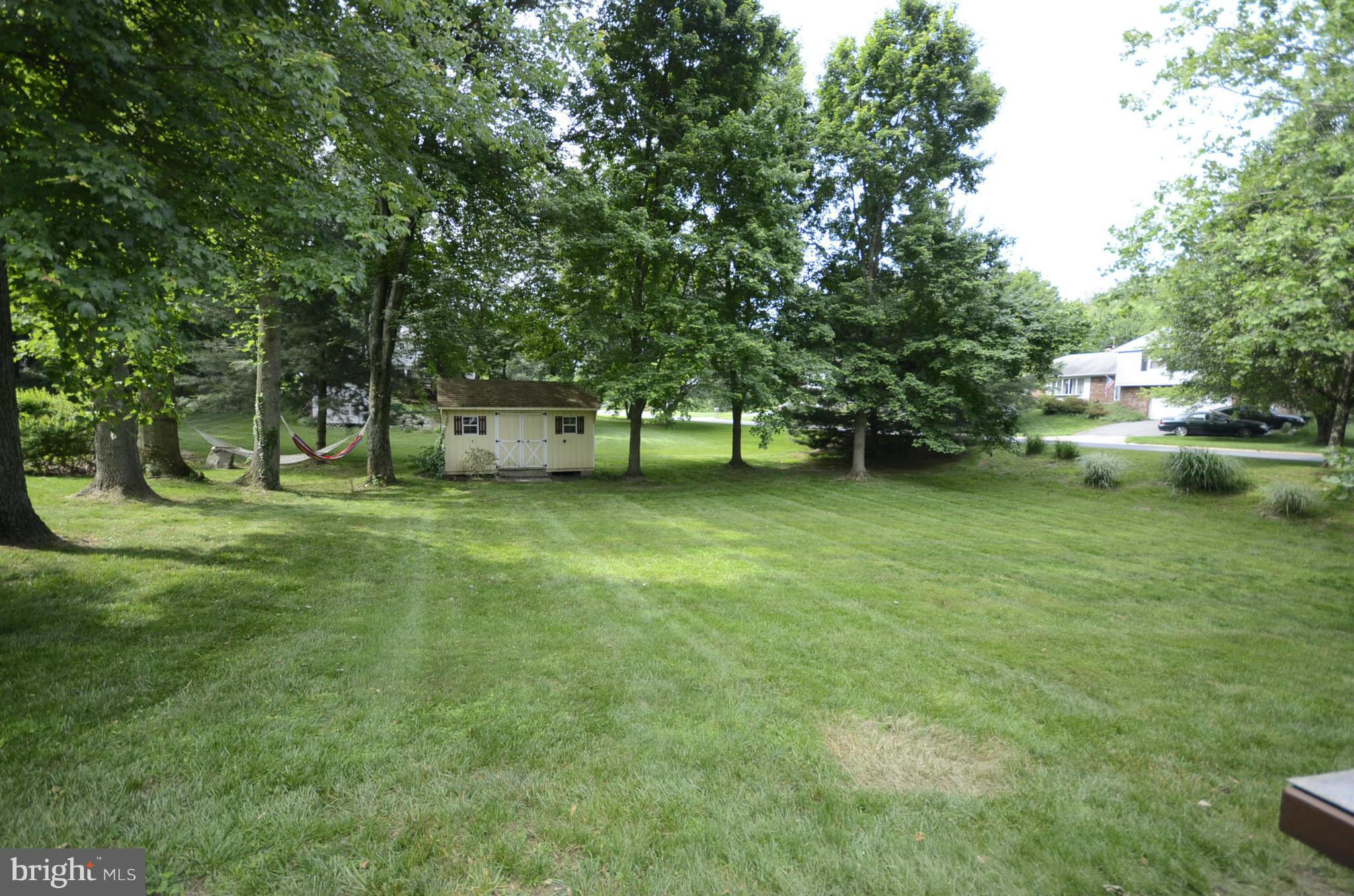 3612 Briars Road Brookeville, MD 20833 - Photo 19 of 21 a view of a house with a big yard