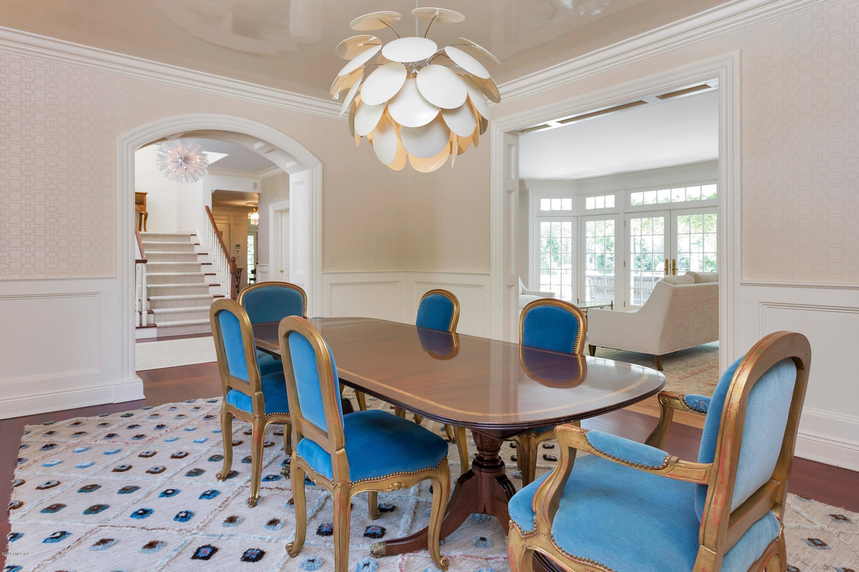 188 Otter Rock Drive Greenwich, CT 06830 - Photo 11 of 23 a view of a dining room with furniture and wooden floor