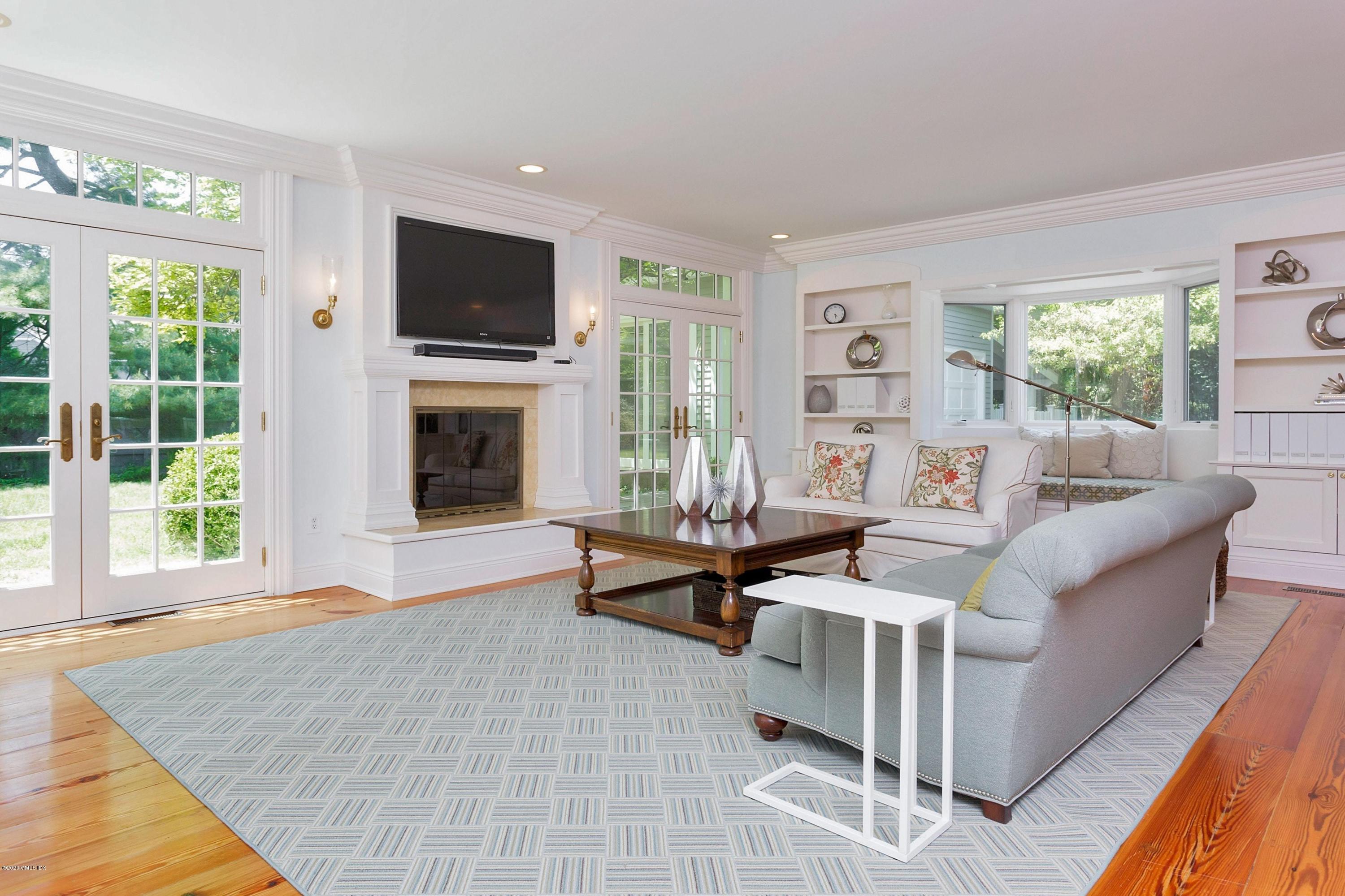188 Otter Rock Drive Greenwich, CT 06830 - Photo 10 of 23 a living room with furniture and a flat screen tv