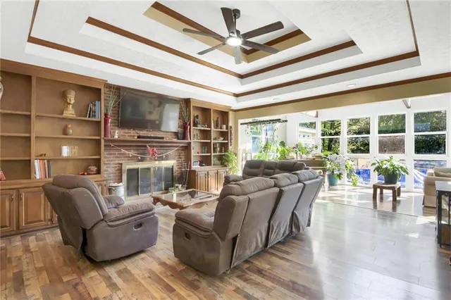 a bathroom with a tub sink and a window