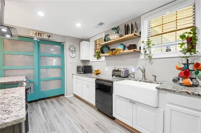 a view of pool and trees in the background