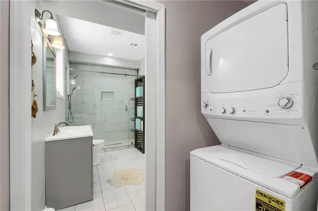 a view of a house with a yard covered with snow in front of house