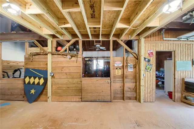 a aerial view of a house with a yard