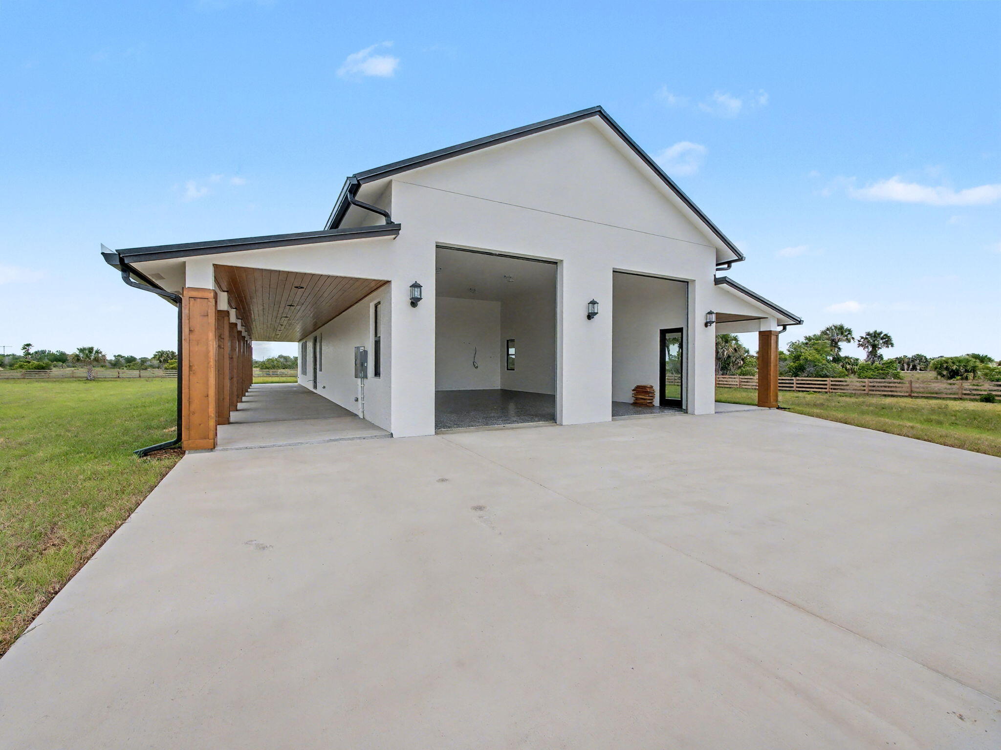 9480 Carlton Road Port St. Lucie, FL 34987 - Photo 12 of 35 a view of a house with backyard and garden