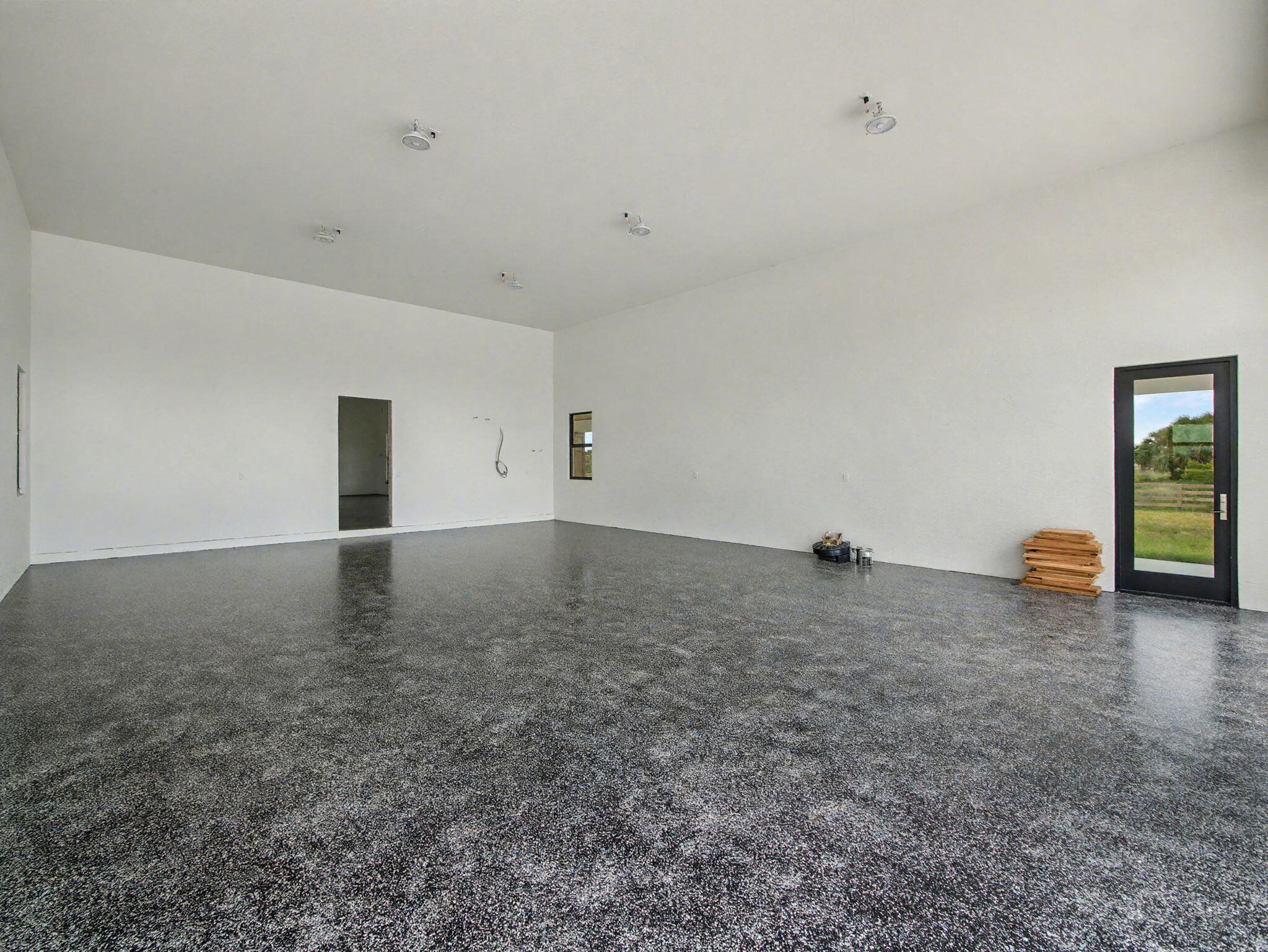 9480 Carlton Road Port St. Lucie, FL 34987 - Photo 19 of 35 a view of empty room with wooden floor