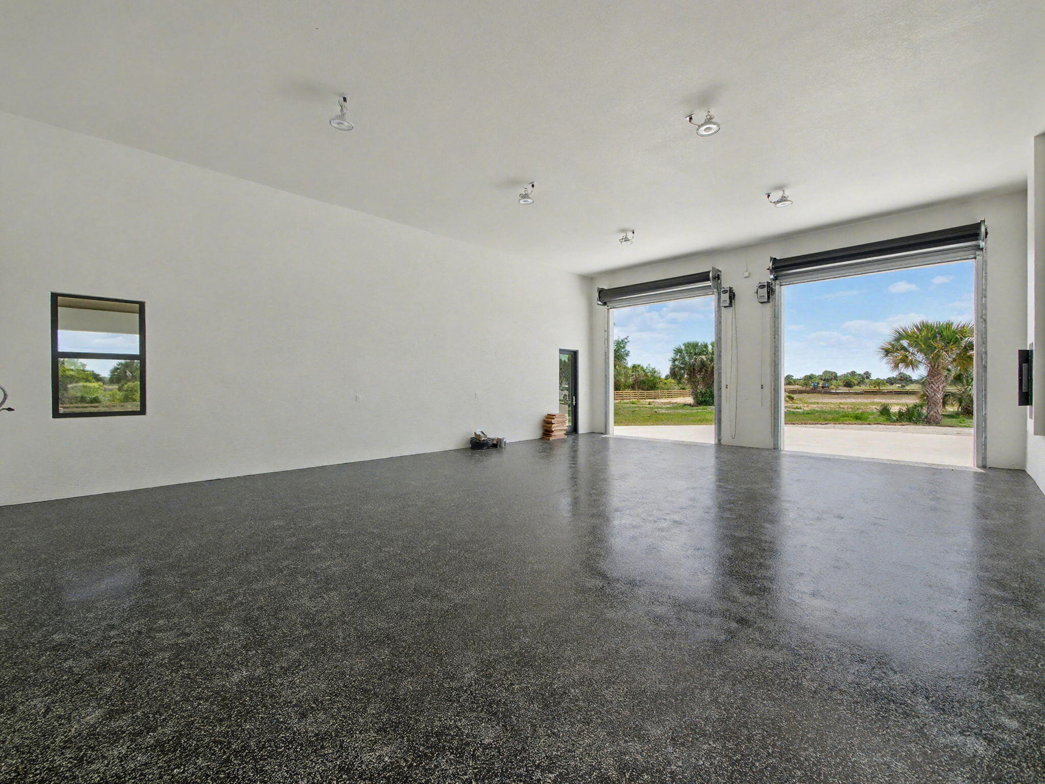 9480 Carlton Road Port St. Lucie, FL 34987 - Photo 21 of 35 a view of an empty room with a window