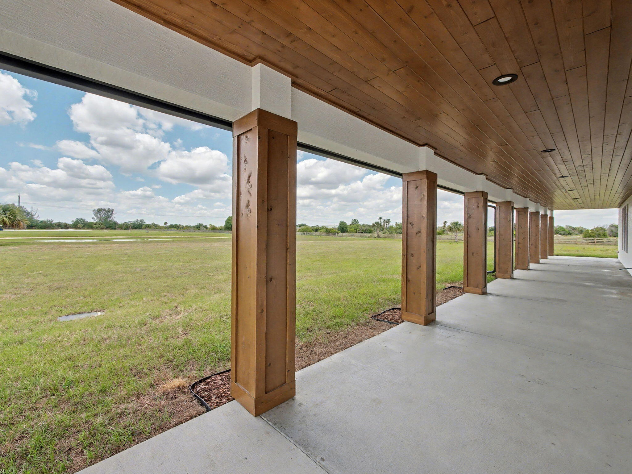 9480 Carlton Road Port St. Lucie, FL 34987 - Photo 25 of 35 a view of a large window with an outdoor space