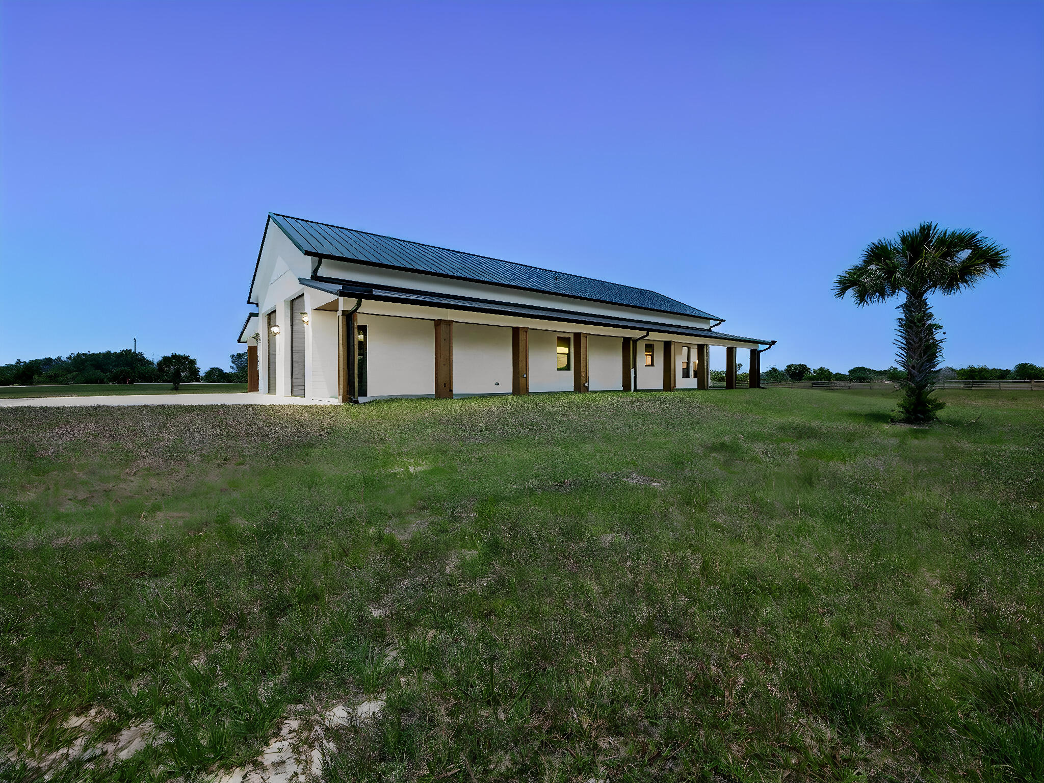 9480 Carlton Road Port St. Lucie, FL 34987 - Photo 34 of 35 a view of a house with a yard