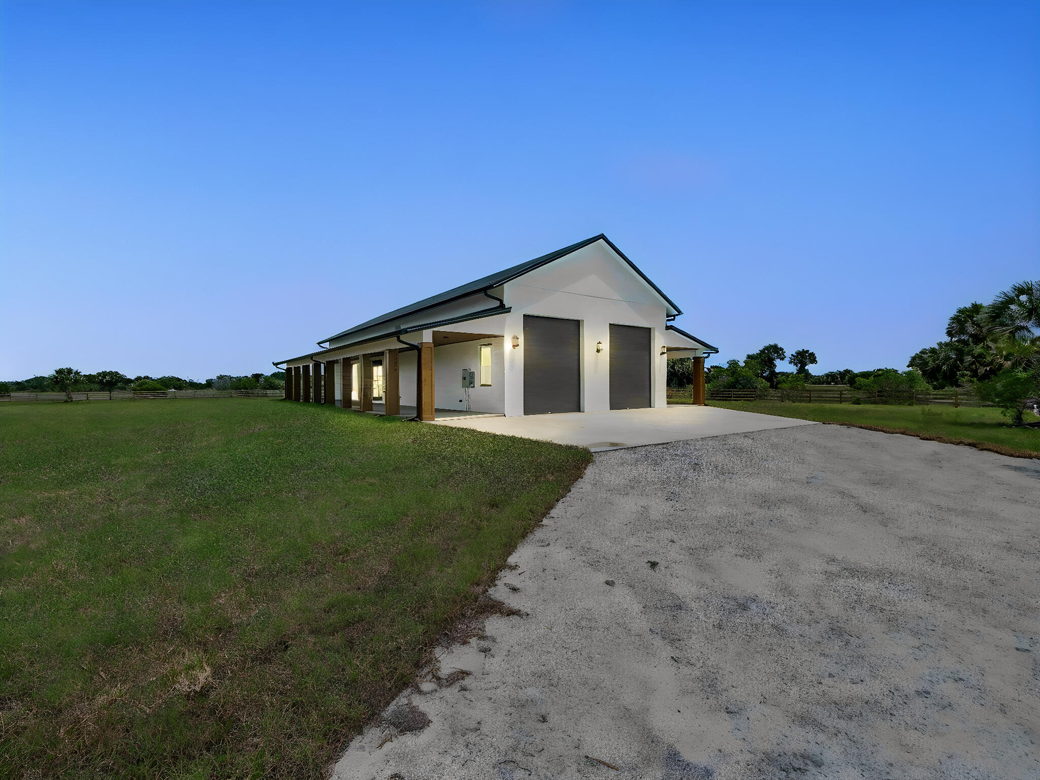 9480 Carlton Road Port St. Lucie, FL 34987 - Photo 35 of 35 a front view of a house with a yard
