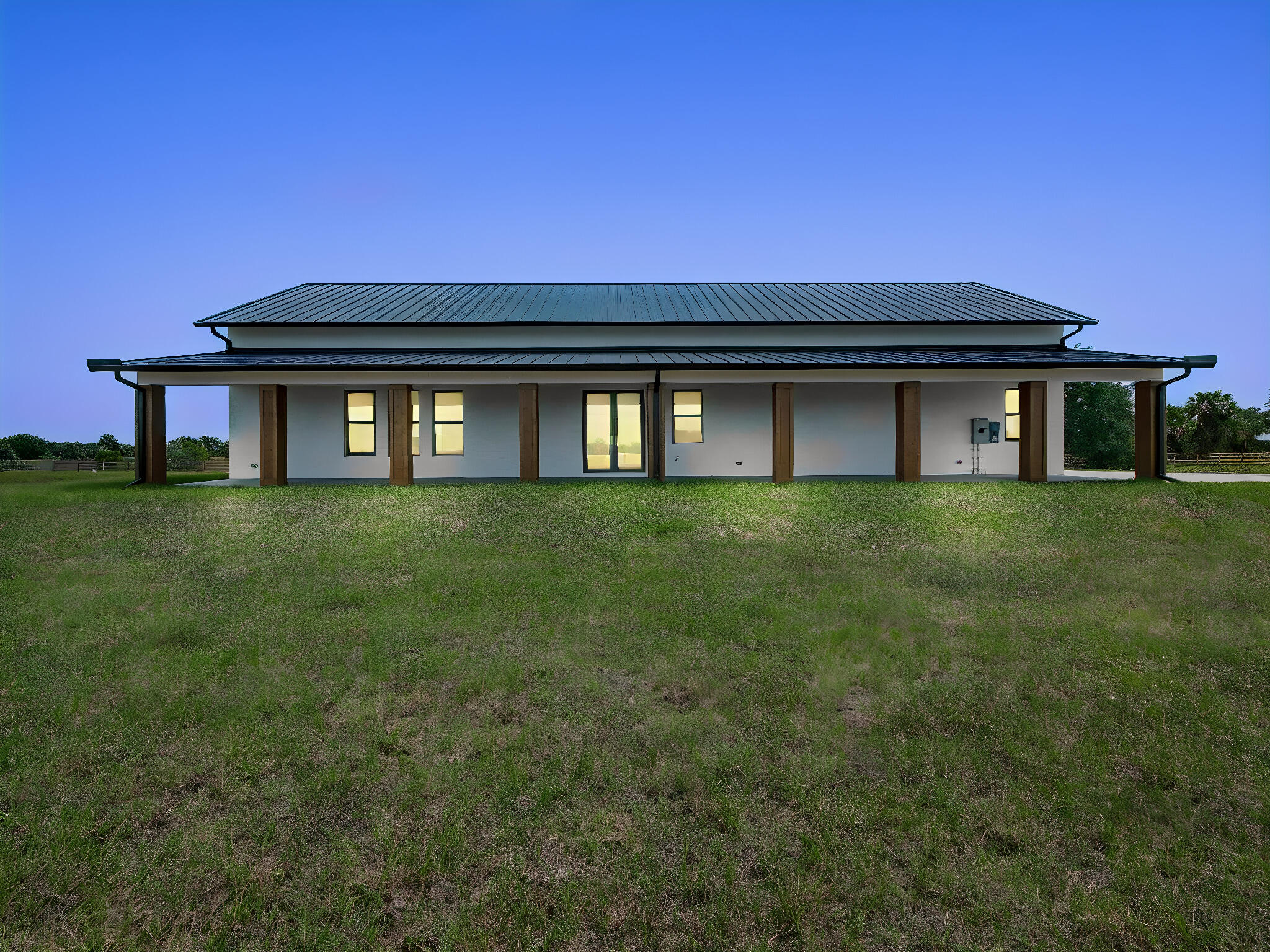 9480 Carlton Road Port St. Lucie, FL 34987 - Photo 4 of 35 a front view of a house with a yard