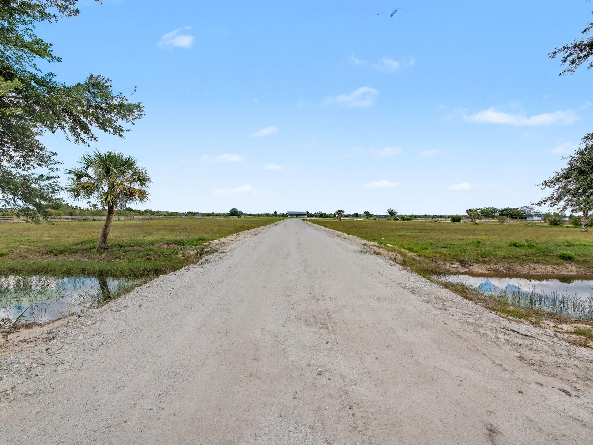 9480 Carlton Road Port St. Lucie, FL 34987 - Photo 9 of 35 a view of a road with an ocean view