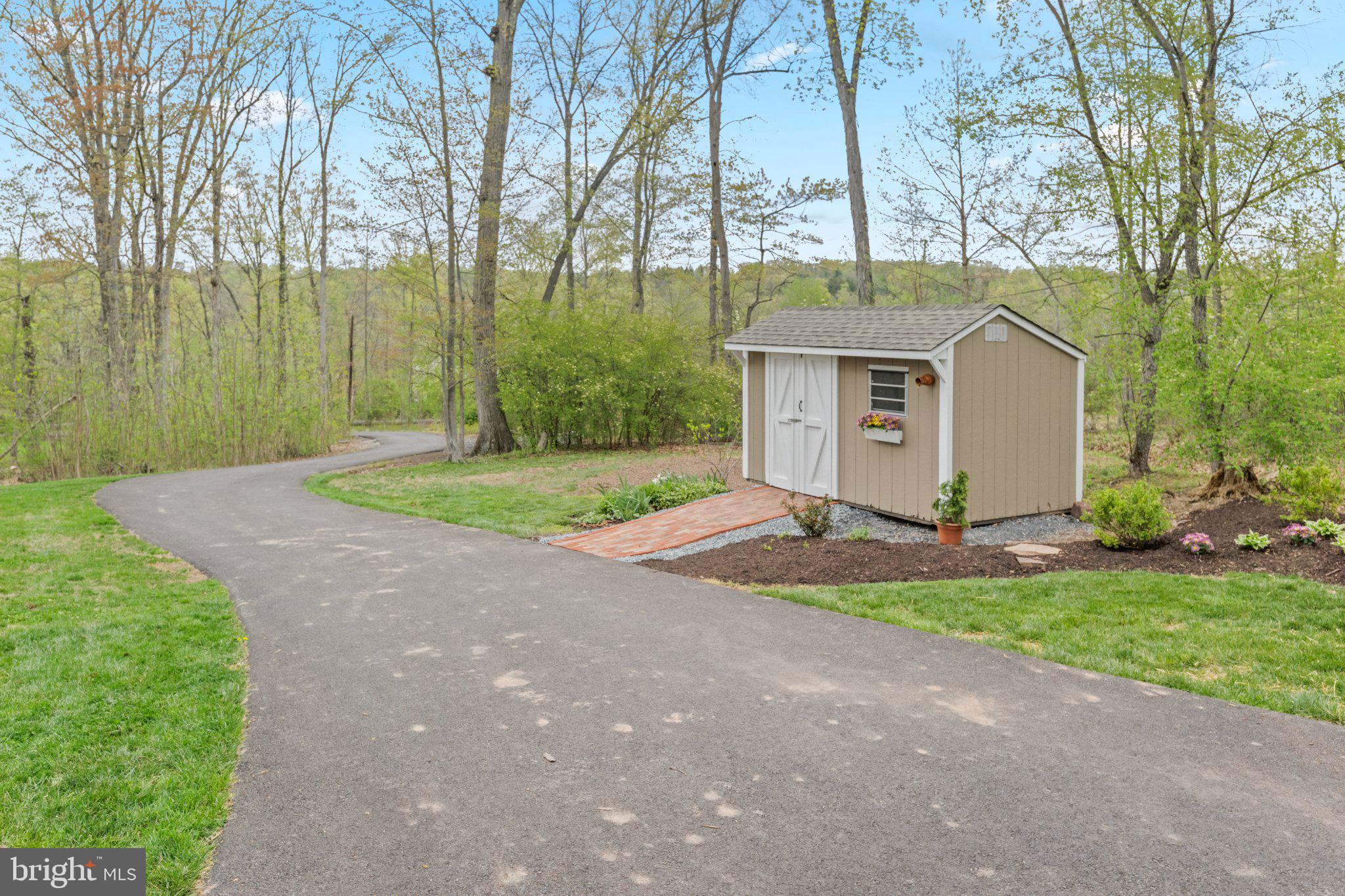 418 Church Road Hatfield, PA 19440 - Photo 46 of 53 Charming shed nestled in serene woods.
