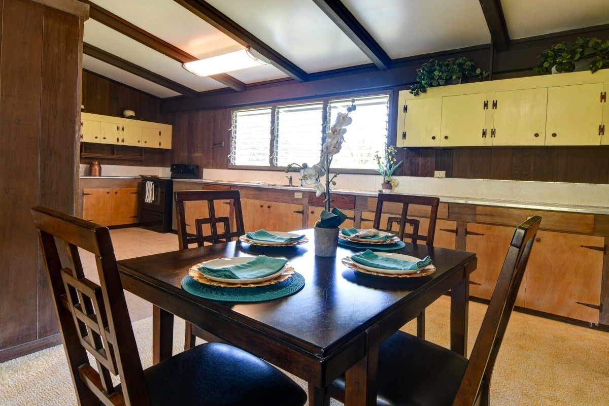 50 B Malaai Road Hilo, HI 96720 - Photo 14 of 30 a view of a dining room with furniture and window