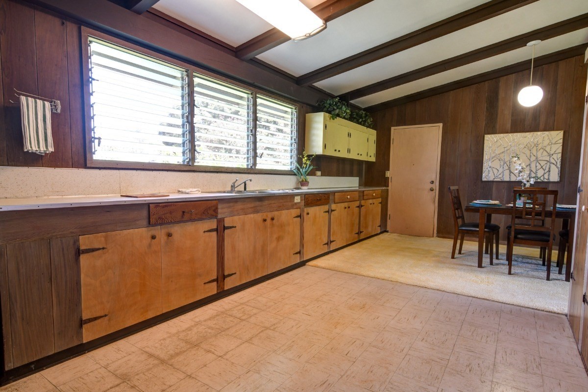 50 B Malaai Road Hilo, HI 96720 - Photo 15 of 30 a large kitchen with stainless steel appliances granite countertop a sink and cabinets