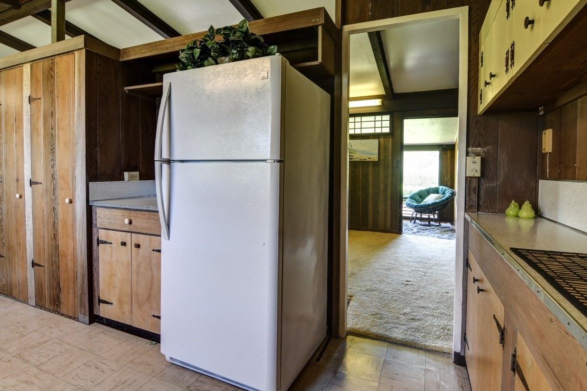 50 B Malaai Road Hilo, HI 96720 - Photo 18 of 30 a view of hallway with furniture and a refrigerator