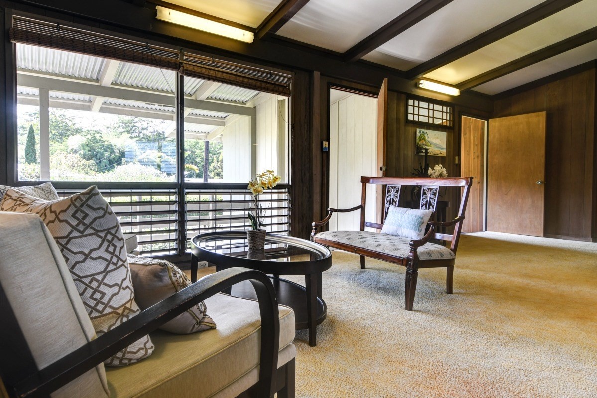 50 B Malaai Road Hilo, HI 96720 - Photo 24 of 30 a living room with furniture and a window
