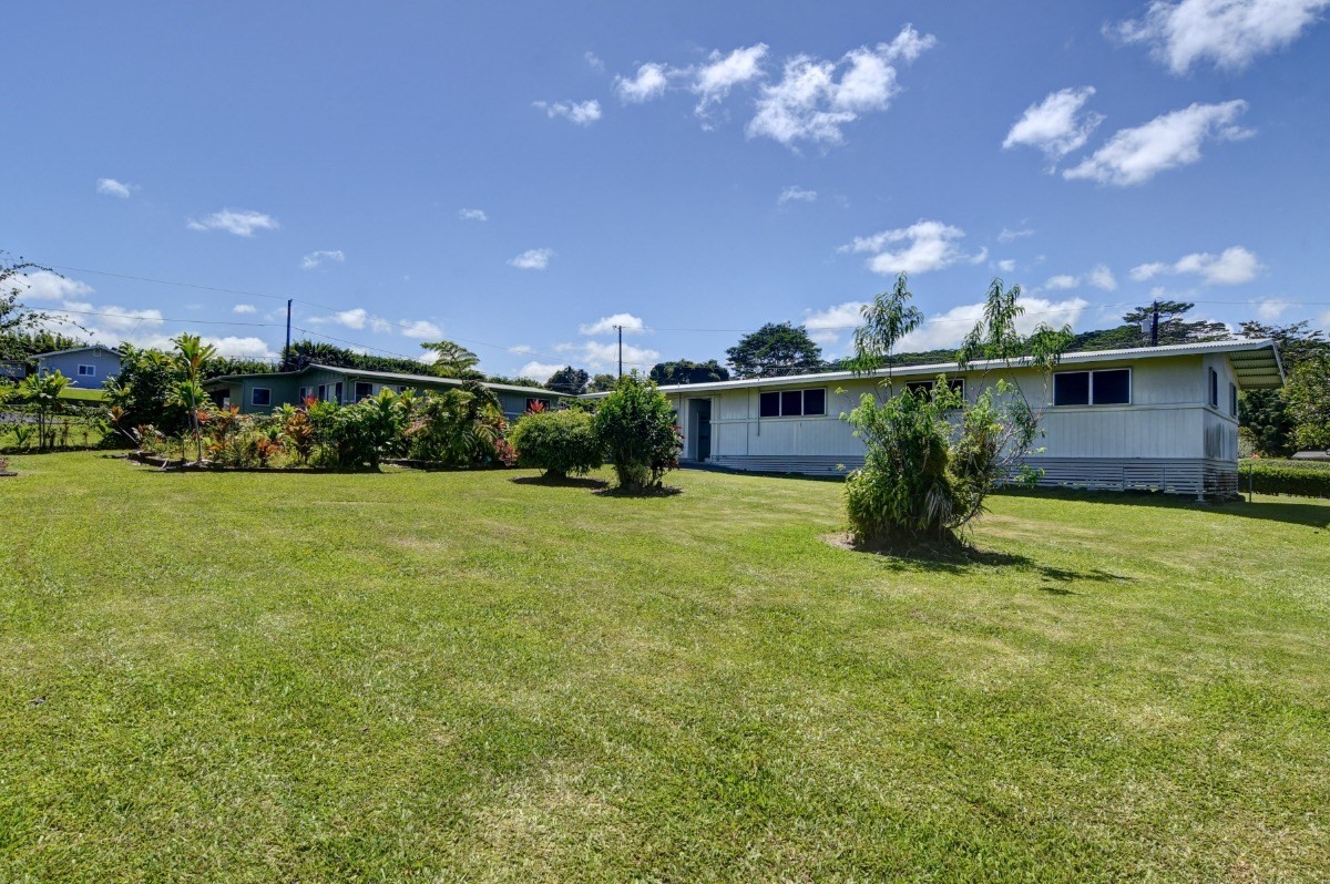 50 B Malaai Road Hilo, HI 96720 - Photo 6 of 30 a view of a house with a backyard porch and sitting area