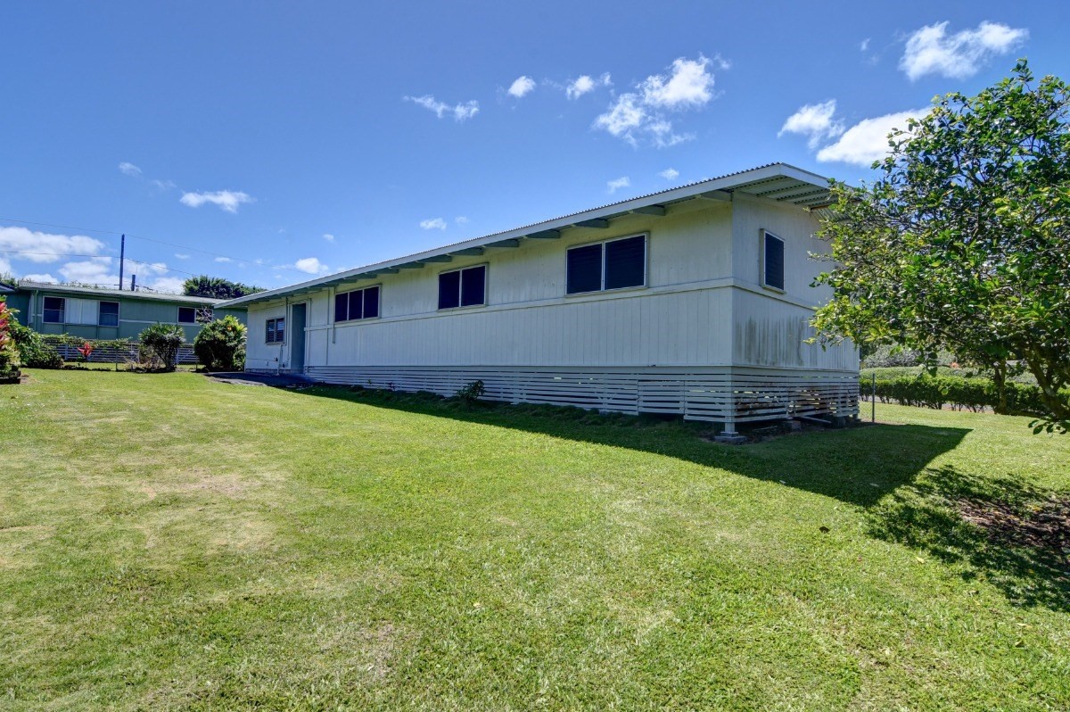 50 B Malaai Road Hilo, HI 96720 - Photo 7 of 30 a house view with a garden space