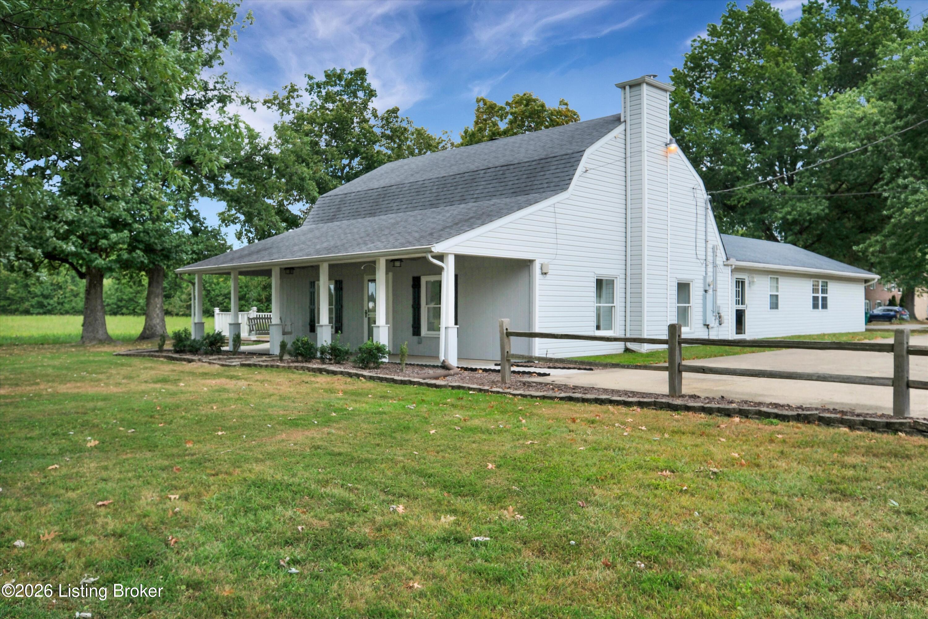 Situated on .54 acres of flat usable land with beautiful mature trees.