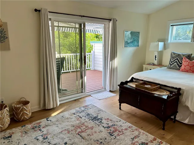 a room with a bed and a window