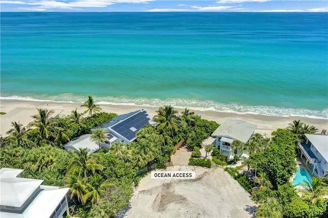 a view of a lake with a yard