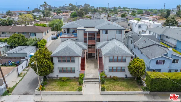 an aerial view of multiple houses