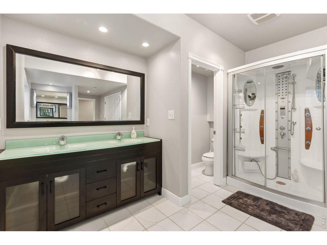 600 Botley Drive Windsor, CO 80550 - Photo 37 of 40 Huge bathroom with multi-head shower