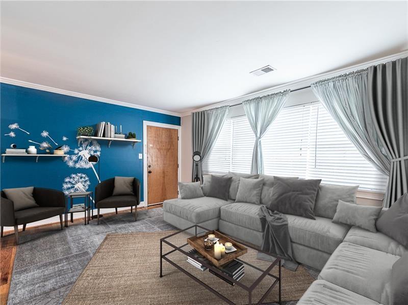 1643 Briarcliff Road Northeast, Unit 6 Atlanta, GA 30306 - Photo 1 of 1 Living area shown with furniture; charming and cozy