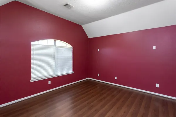 a view of a livingroom with wooden floor