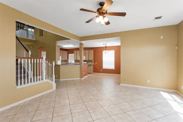 a view of a livingroom with a staircase