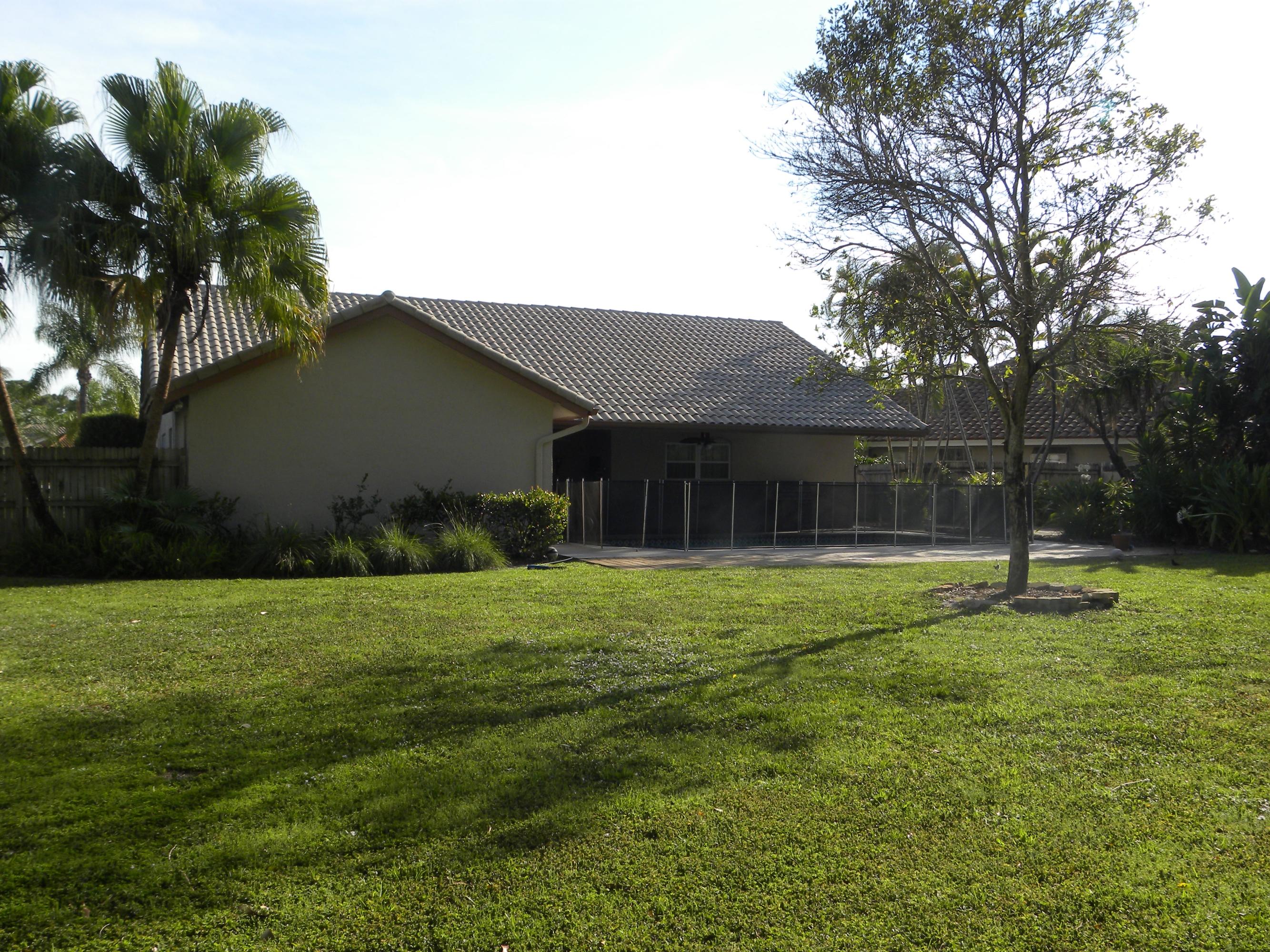 5074 Marina Circle Boca Raton, FL 33486 - Photo 34 of 36 Rear of house
