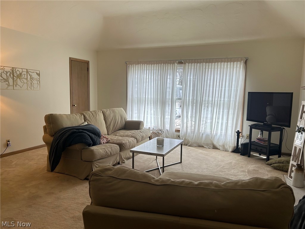 2537 Falmouth Road Akron, OH 44333 - Photo 27 of 35 Living room featuring light carpet