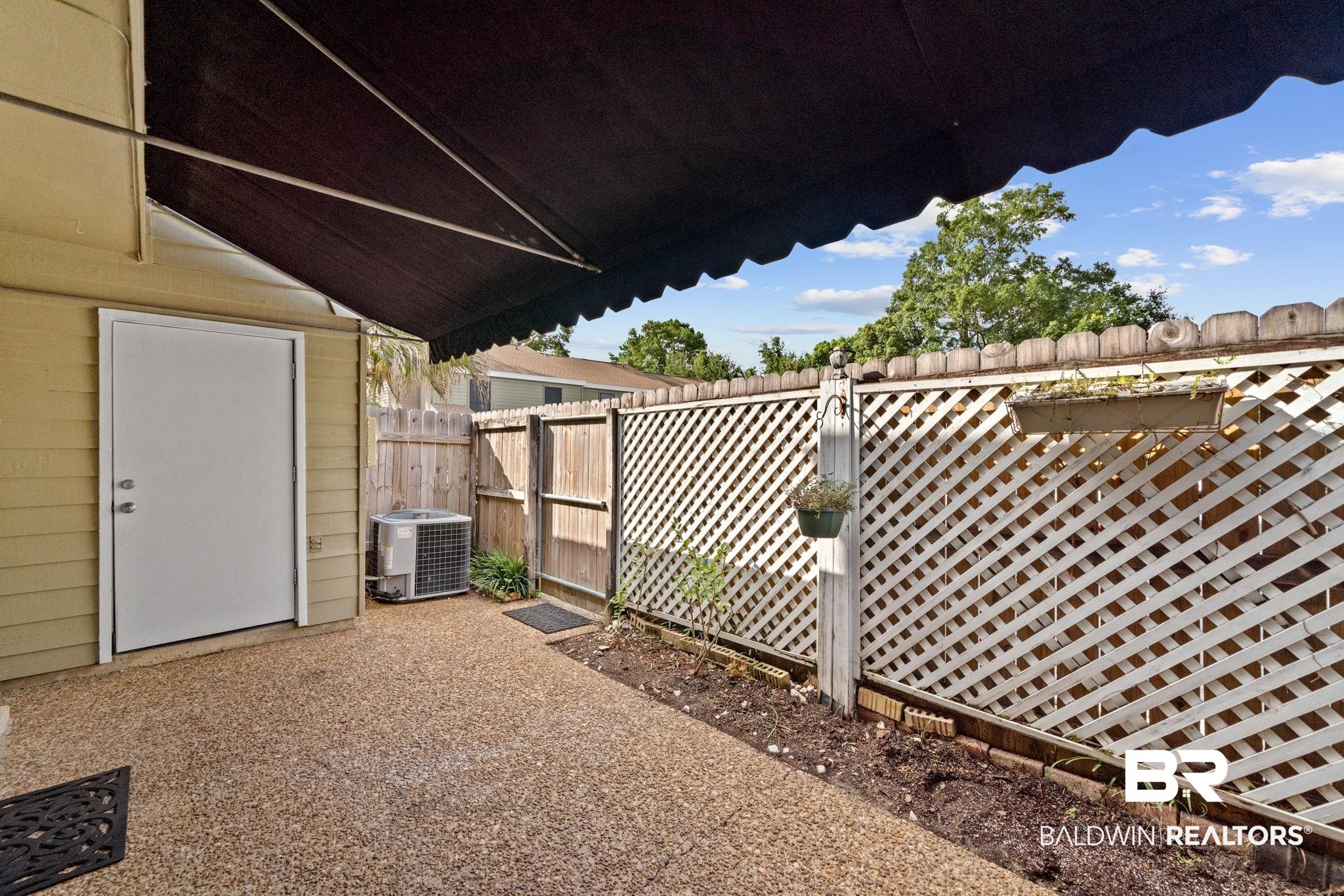 2901 Grant Street, Unit 802 Mobile, AL 36606 - Photo 30 of 37 View of yard with central air condition unit and a patio area