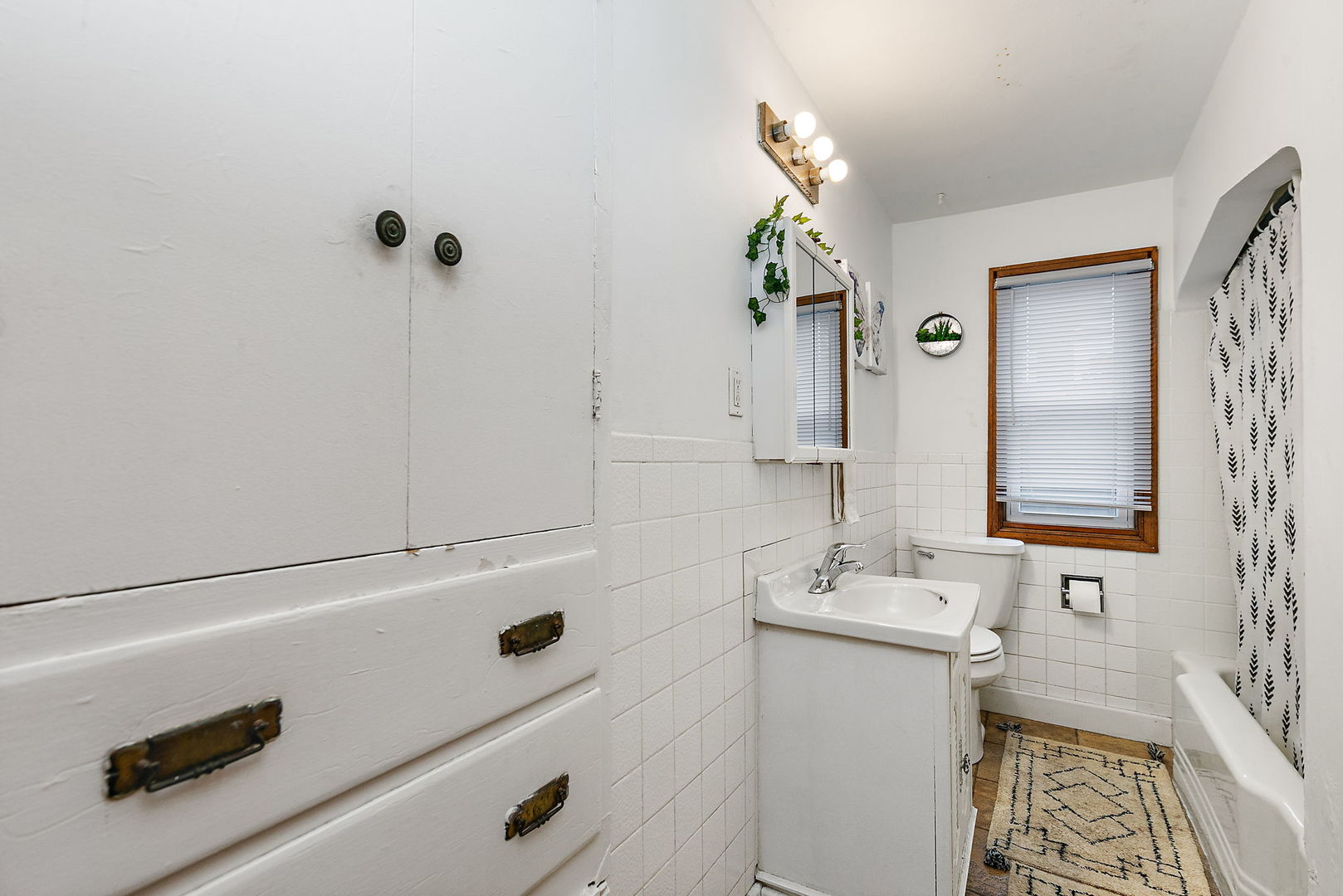 820 Lincoln Highway Rochelle, IL 61068 - Photo 13 of 27 a bathroom with a sink and a mirror