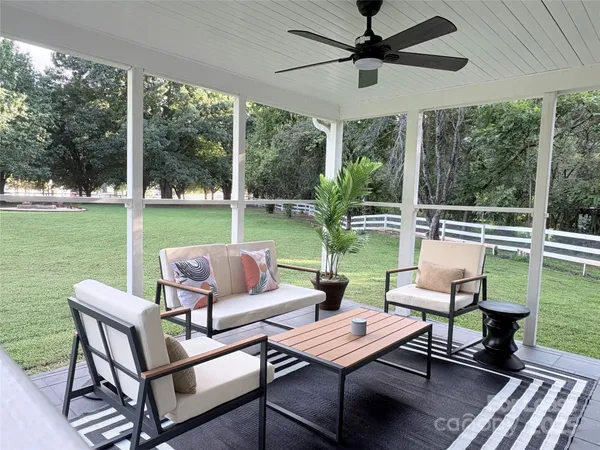 a view of a patio with garden