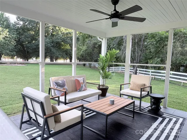 a view of a patio with garden