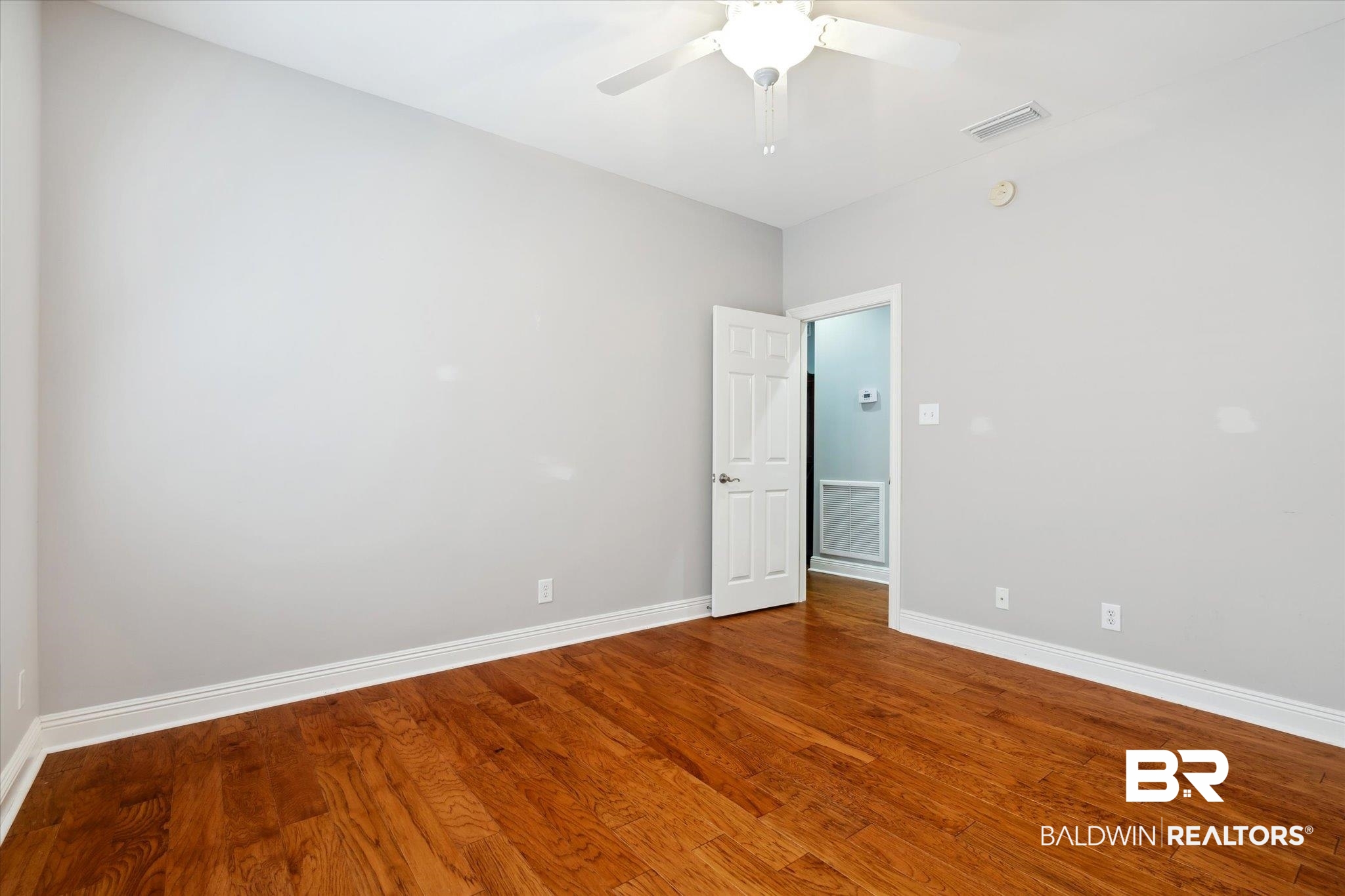 804 Country Club Road Mobile, AL 36609 - Photo 51 of 63 Unfurnished room featuring ceiling fan and wood-type flooring