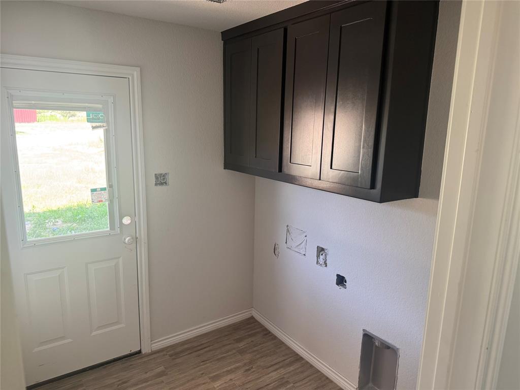 163 Agnes Circle Springtown, TX 76082 - Photo 7 of 7 a view of wooden door