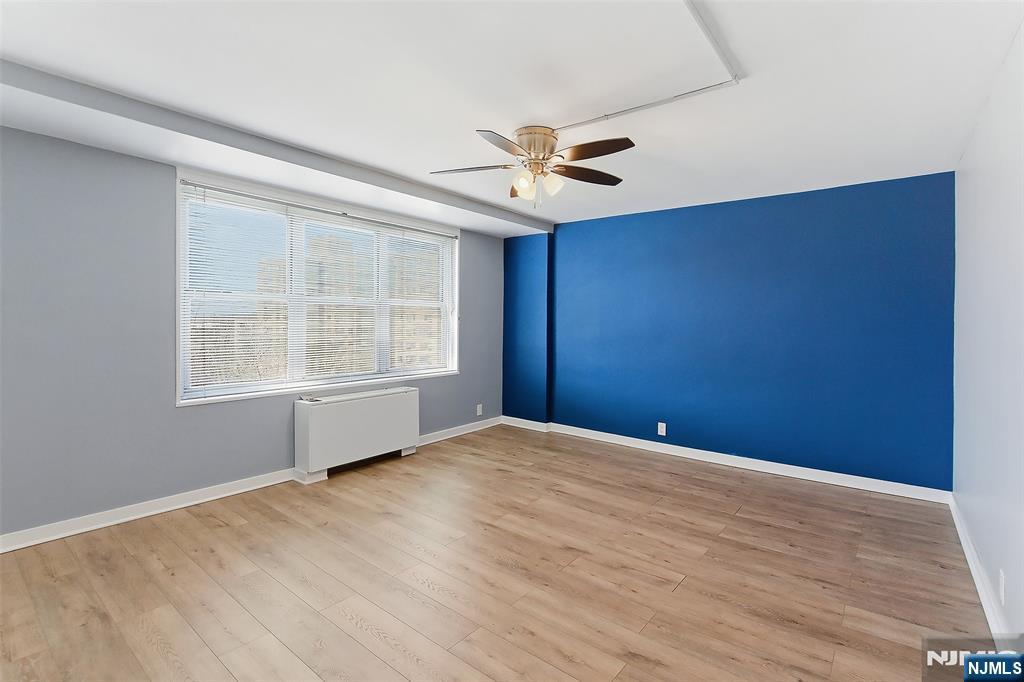 301 Beech Street, Unit 9K Hackensack, NJ 07601 - Photo 18 of 24 a view of an empty room with a window