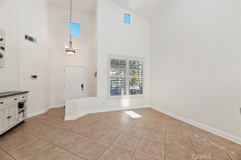 1040 Nighthawk Circle Corona, CA 92881 - Photo 11 of 39 a view of an empty room with a window