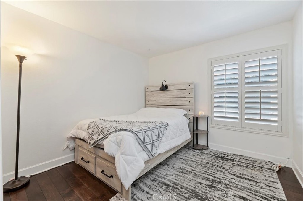 1040 Nighthawk Circle Corona, CA 92881 - Photo 24 of 39 a bedroom with a bed and a window