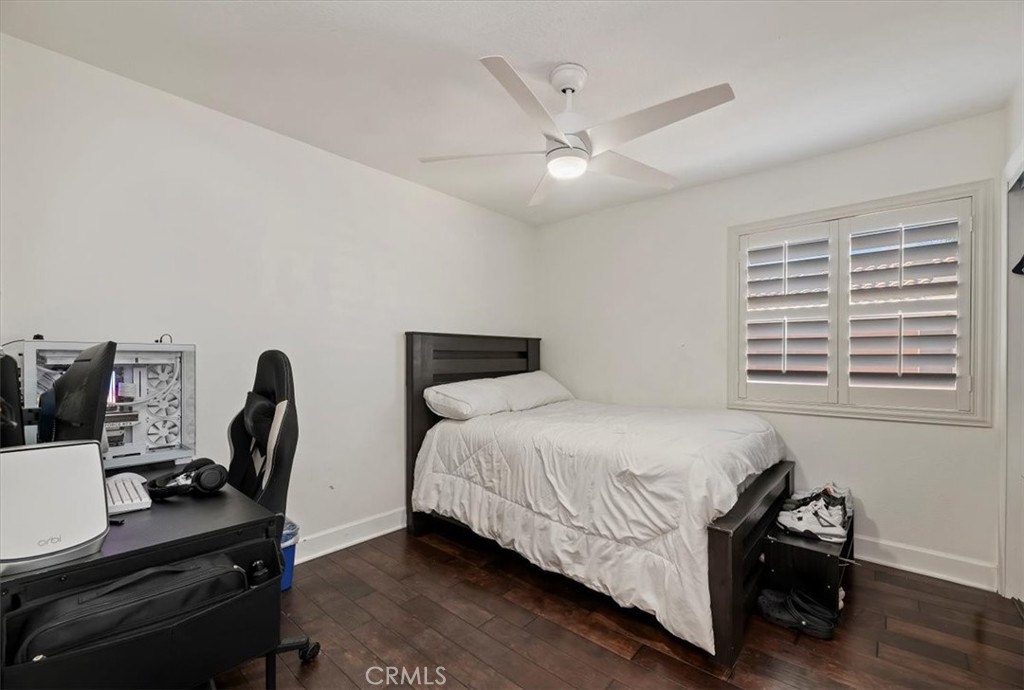 1040 Nighthawk Circle Corona, CA 92881 - Photo 32 of 39 a bedroom with a bed and a desk