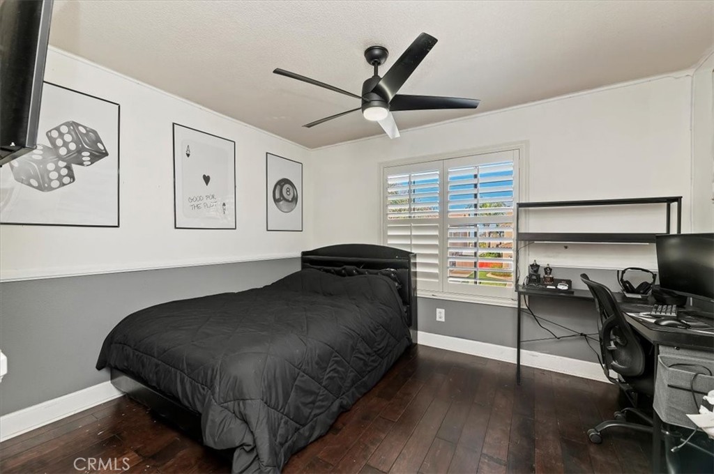 1040 Nighthawk Circle Corona, CA 92881 - Photo 35 of 39 a bedroom with a bed and a desk