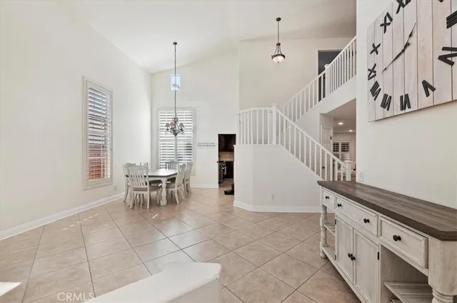 a view of dining room with furniture and window