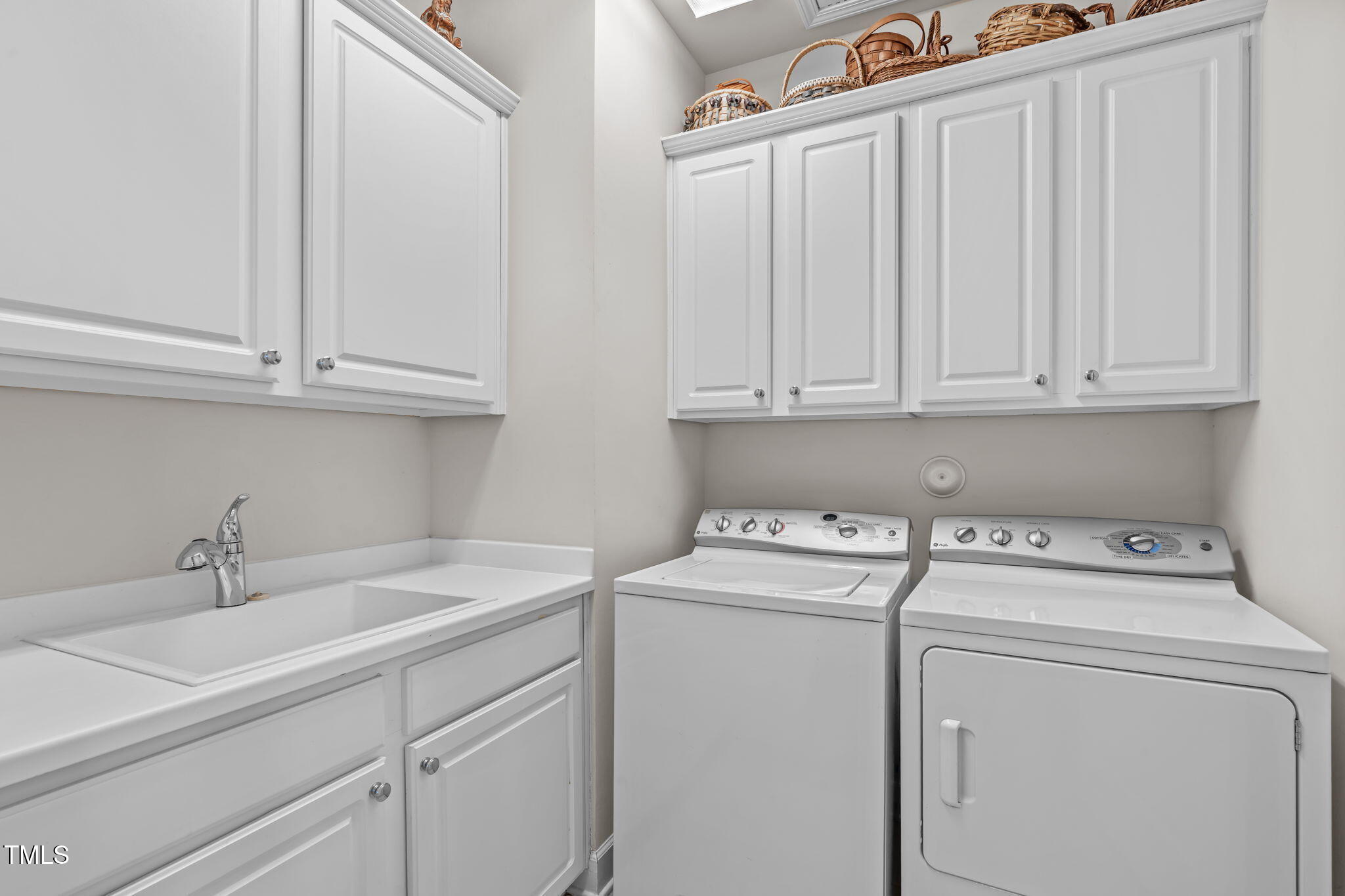 208 Beckingham Loop Cary, NC 27519 - Photo 22 of 47 a utility room with dryer and washer