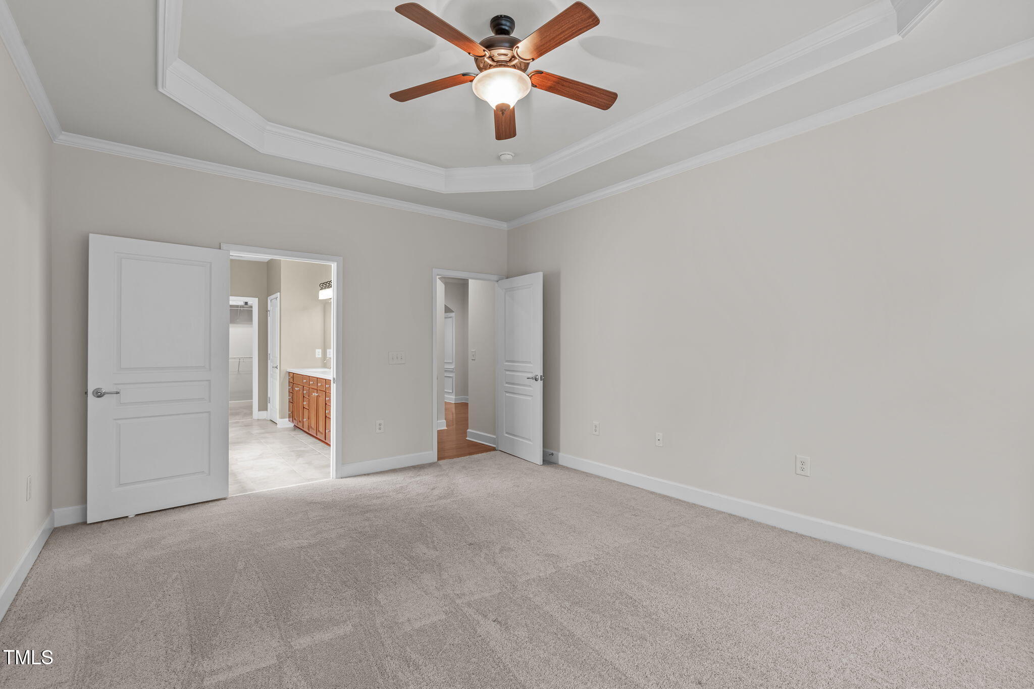 208 Beckingham Loop Cary, NC 27519 - Photo 24 of 47 a view of a room with a ceiling fan and closet area