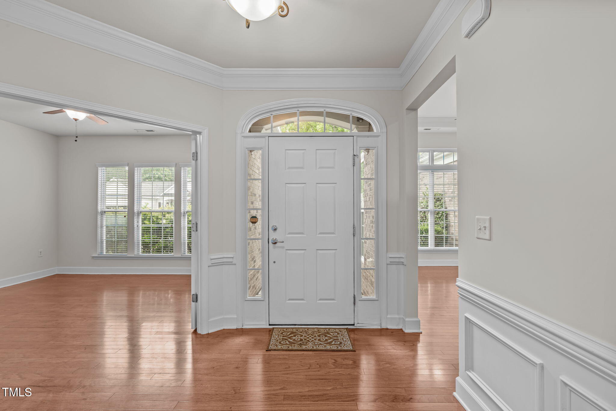 208 Beckingham Loop Cary, NC 27519 - Photo 3 of 47 a view of empty room with wooden floor and fan