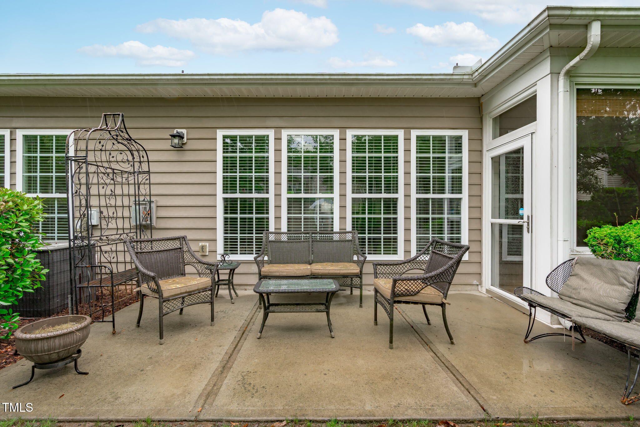 208 Beckingham Loop Cary, NC 27519 - Photo 40 of 47 a balcony with couple of chairs and a potted plant