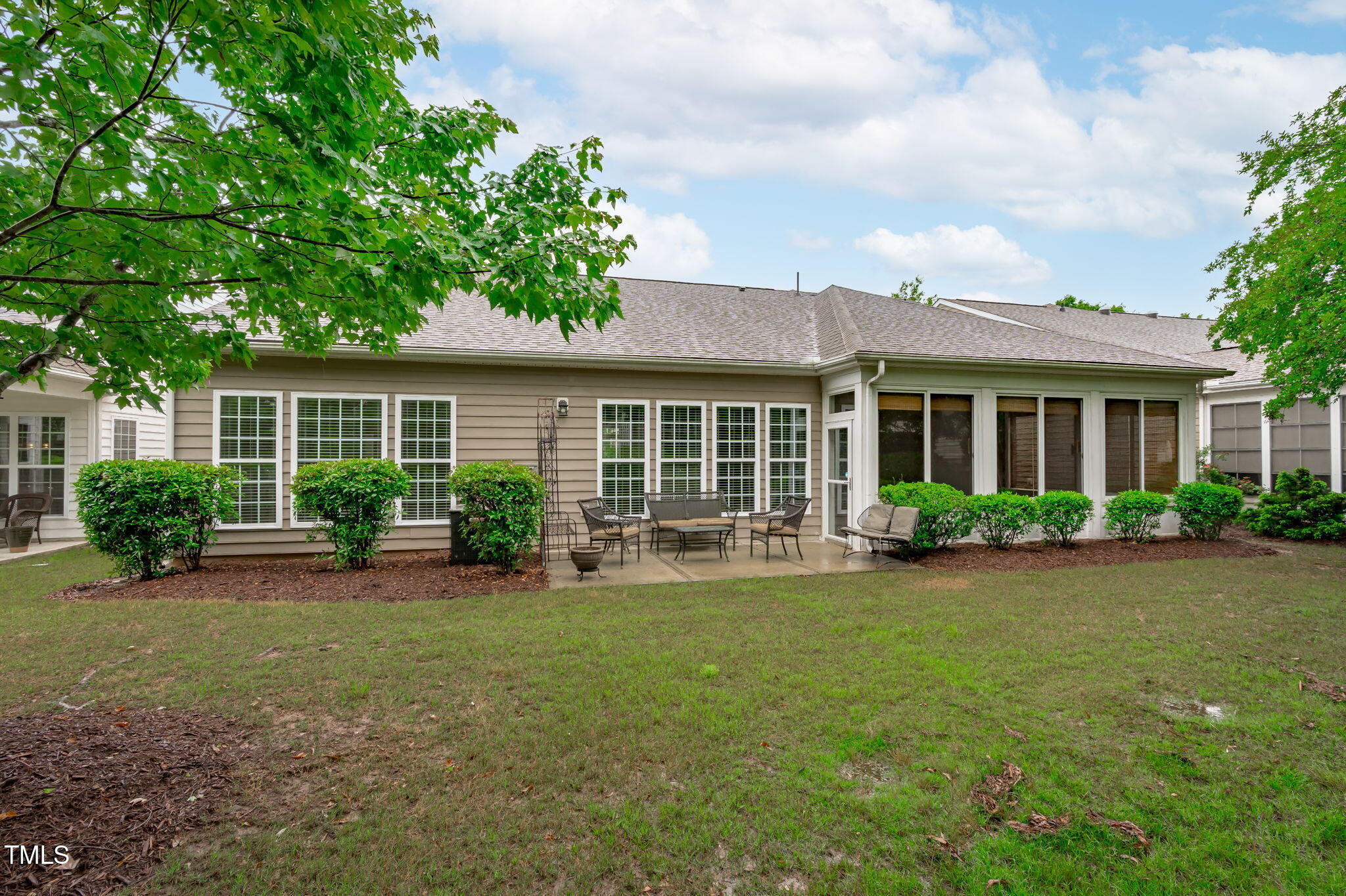 208 Beckingham Loop Cary, NC 27519 - Photo 42 of 47 front view of a house with a yard and potted plants